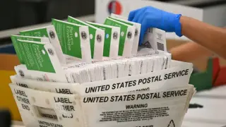 USPS ties ballot delivery to states sharing voter lists under Trump order
