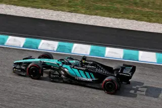 Mercedes struggles with Sepang's abrasive surface as Verstappen claims pole in chaotic F1 return