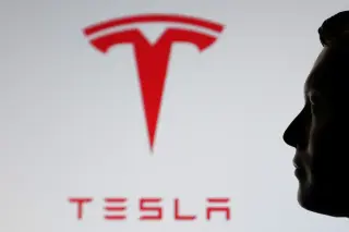 Tesla earnings hedge: a $375 put could guard a 100-share position