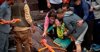 Nepal mourners mark missing relatives with symbolic cremations amid flood disaster