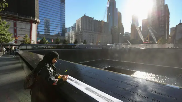 New York marks 9/11 anniversary as Trump skips ceremony and first Muslim mayor attends
