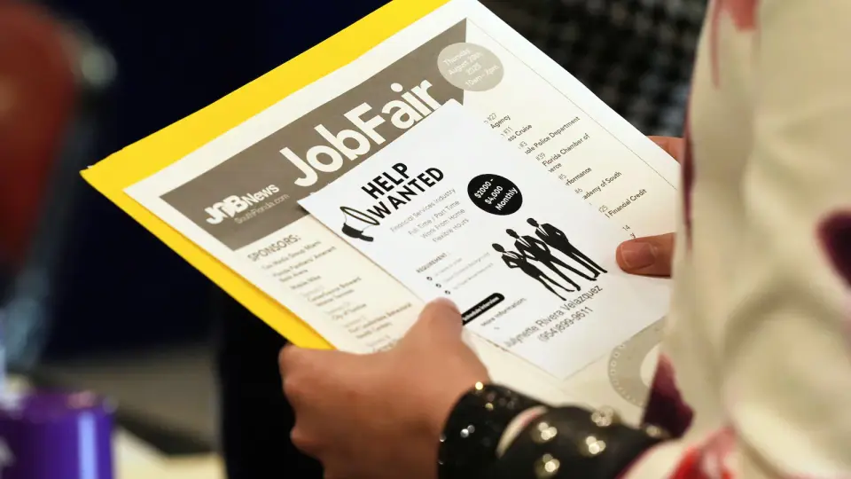Jobless claims dip to 203,000 as hiring remains sluggish