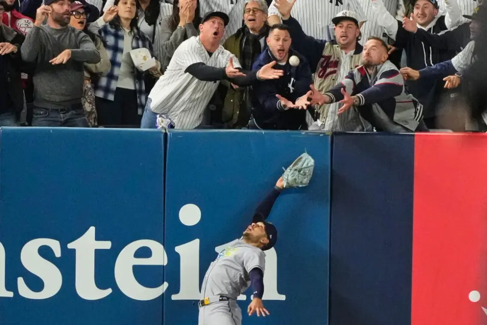 Fan interference call ends Yankees' season as Rays complete ALDS sweep