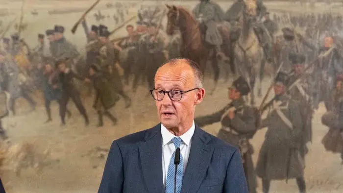 Merz Warns of Severe Russian Hybrid Attacks as Domestic Support for Ukraine Fractures