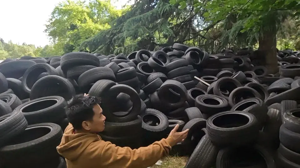 Portland yard buried under hundreds of tires prompts investigation