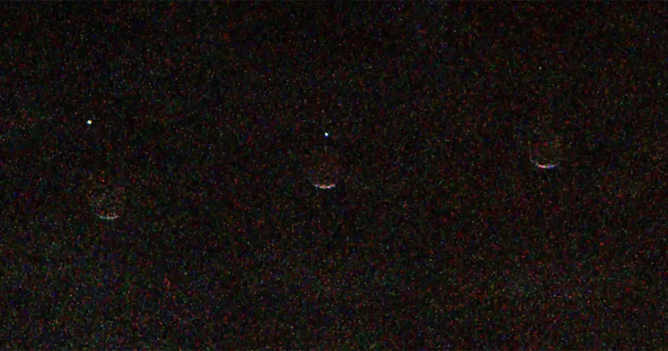 Earth as a Tiny Speck: Mars rover captures a rare Earth-Phobos moment