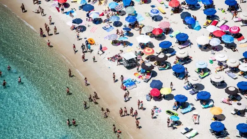 Sardinia’s Punta Molentis bans umbrellas for most beachgoers this summer