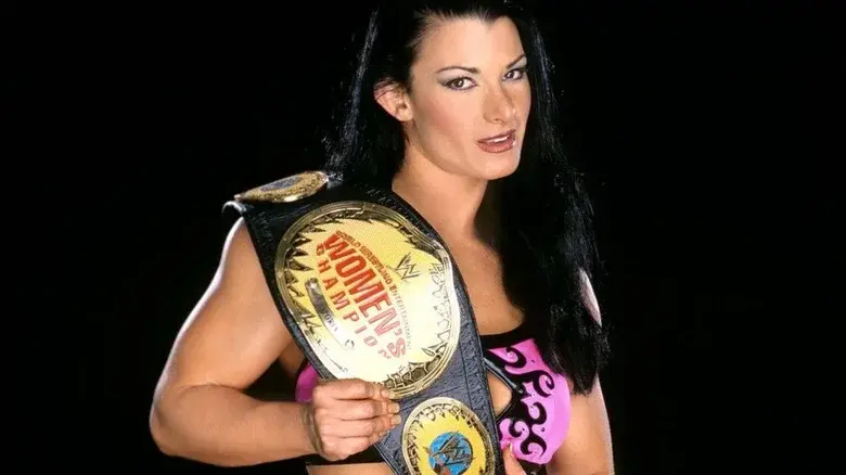 Victoria steps away from the ring after a landmark wrestling career