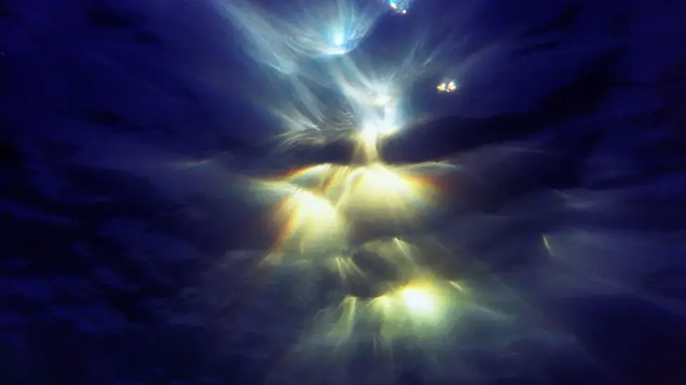 Direct-and-Reflected Wave Interference Makes Energy Peak Early, But Information Still Travels at Light Speed