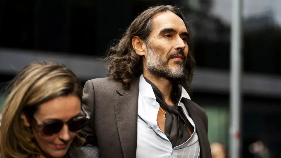 Judge dismisses one charge against Russell Brand as trial hears his defense of 'promiscuous' past