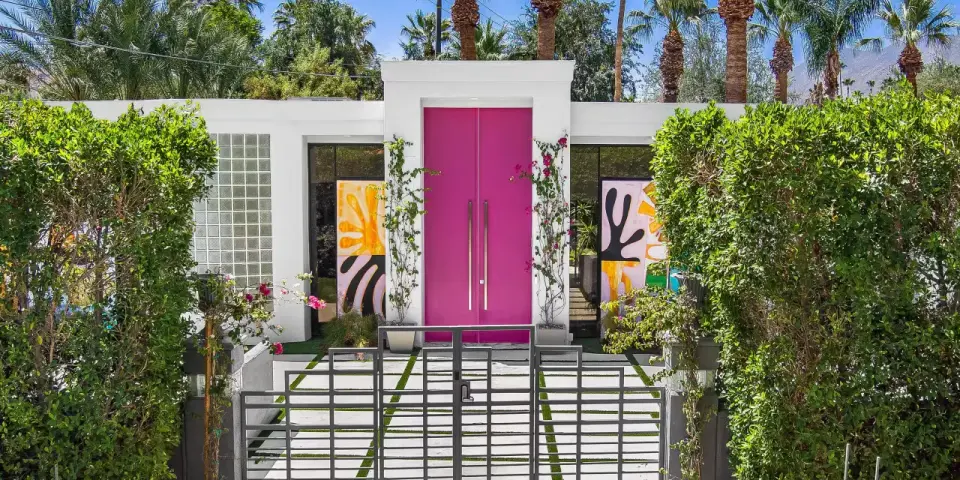 Palm Springs Couple Lists 1954 'Happy House' with Pink Doors and Murals for $2.3M