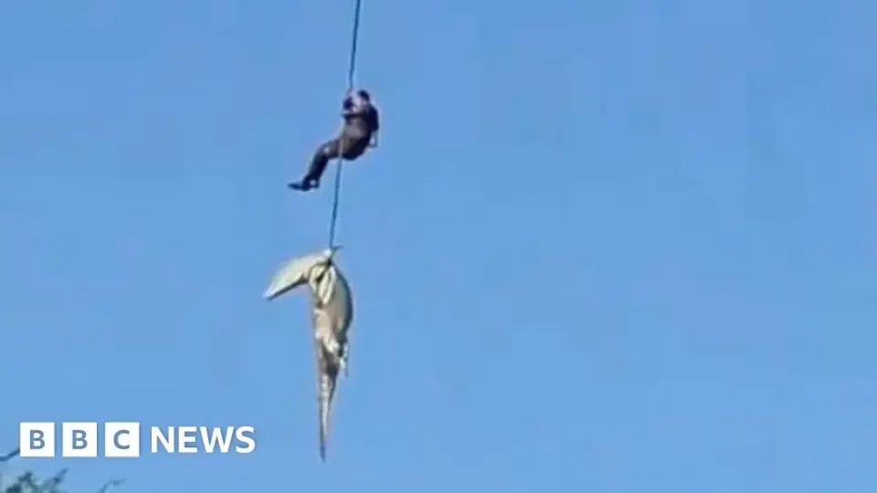 Daring helicopter dive yields remains from crocodile-infested river in South Africa