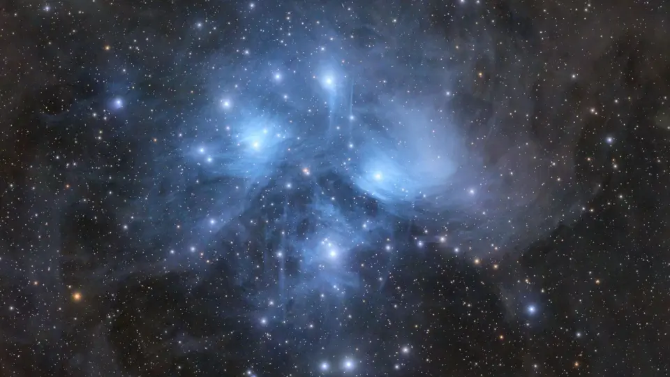 Amateur captures ethereal blue veil around the Pleiades’ Seven Sisters