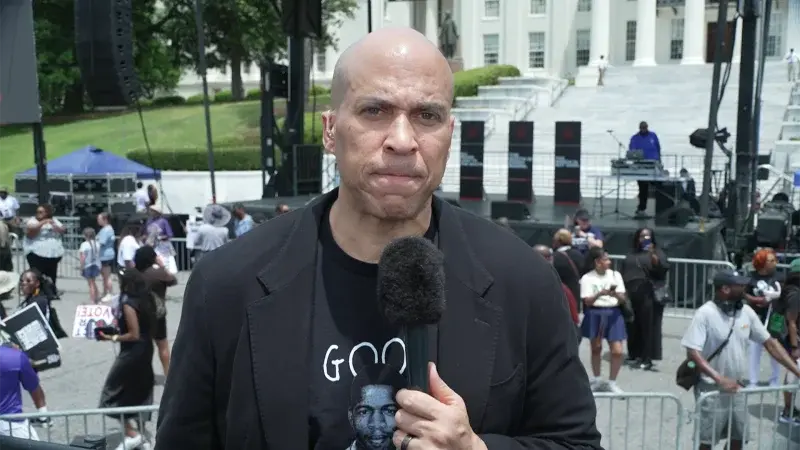Booker urges active participation at Alabama voting rights rally