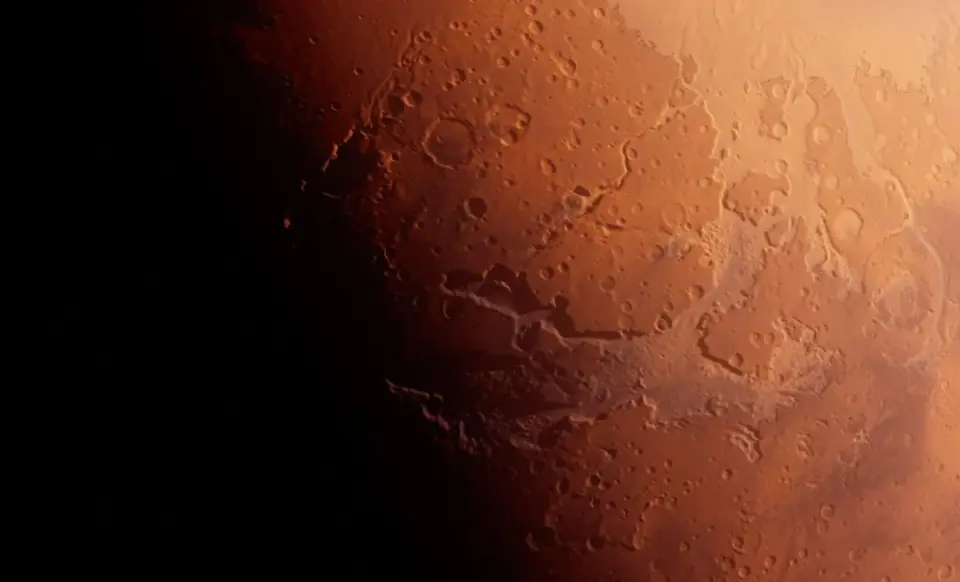 Tiny Probe Snaps Fresh Mars Crescent Ahead of Psyche Mission