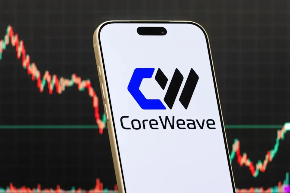 ARK Buys CoreWeave Amid AI Debt Crisis