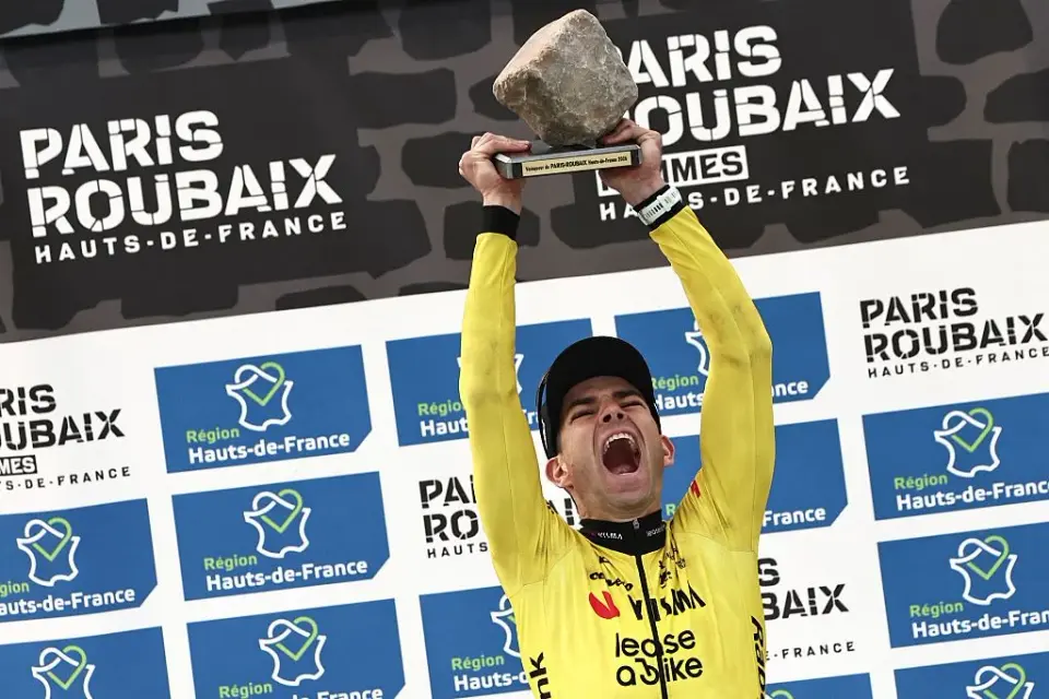 Van Aert's Cobblestone Triumph: A Victory Dedicates to a Fallen Teammate