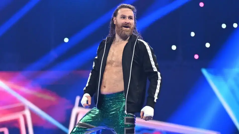 Gunther chokes Cody Rhodes as Sami Zayn walks away on SmackDown