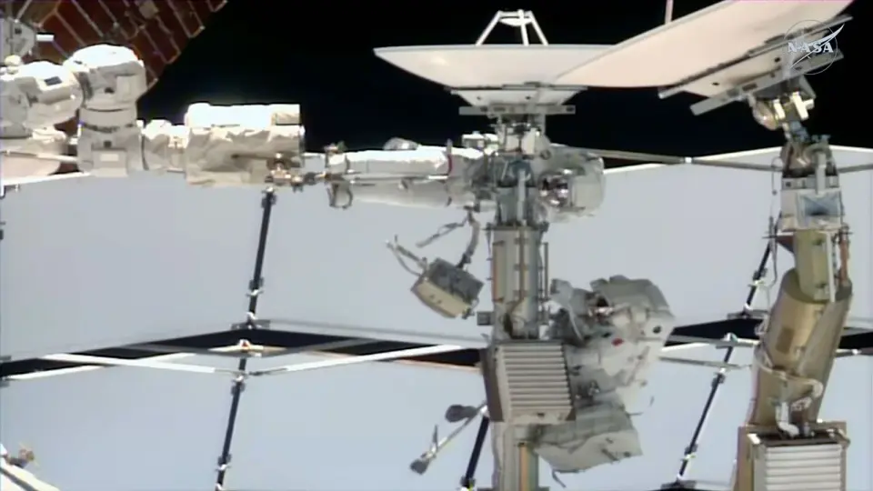 French spacewalker Adenot helps remove failed ISS antenna; replacement postponed