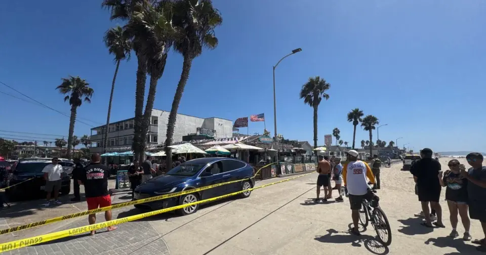 Bystanders chase down driver after stolen Tesla plows into San Diego boardwalk, injuring woman