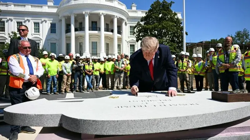 Trump Unveils White House Upgrades, Signs Granite for Helipad