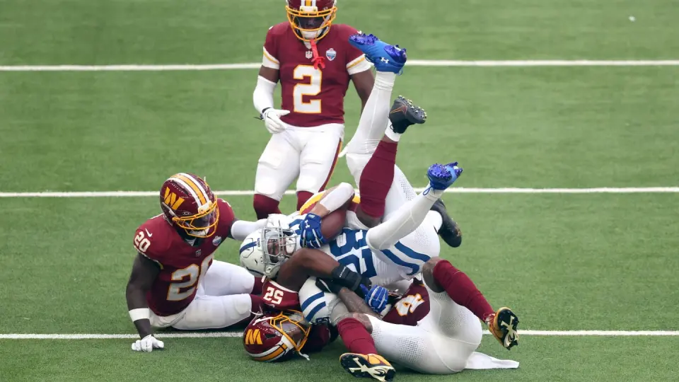Colts defeat Commanders 30-13 in London as Taylor scores twice and Washington faces QB crisis
