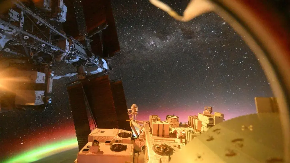 Aurora over Earth and Alpha Centauri: rare ISS vantage point