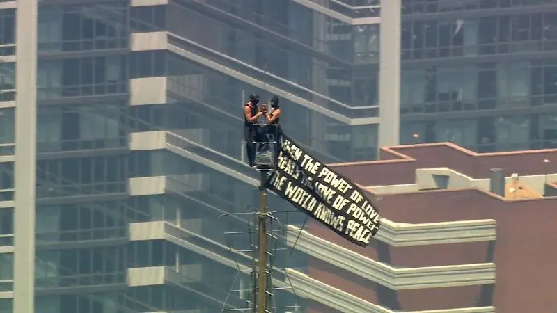 Daring Empire State Building ascent ends with arrests after peace banner display