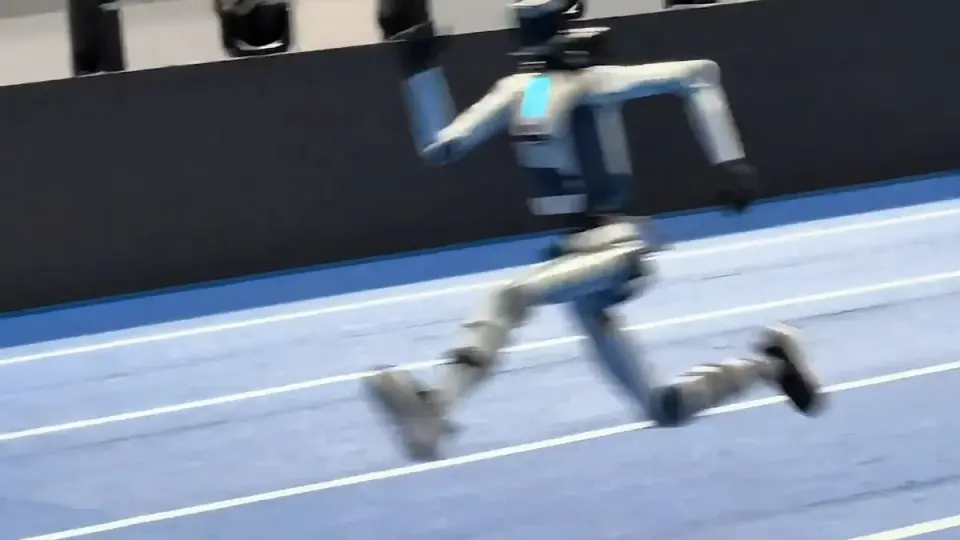 Beijing humanoid robot races around track in test ahead of world games