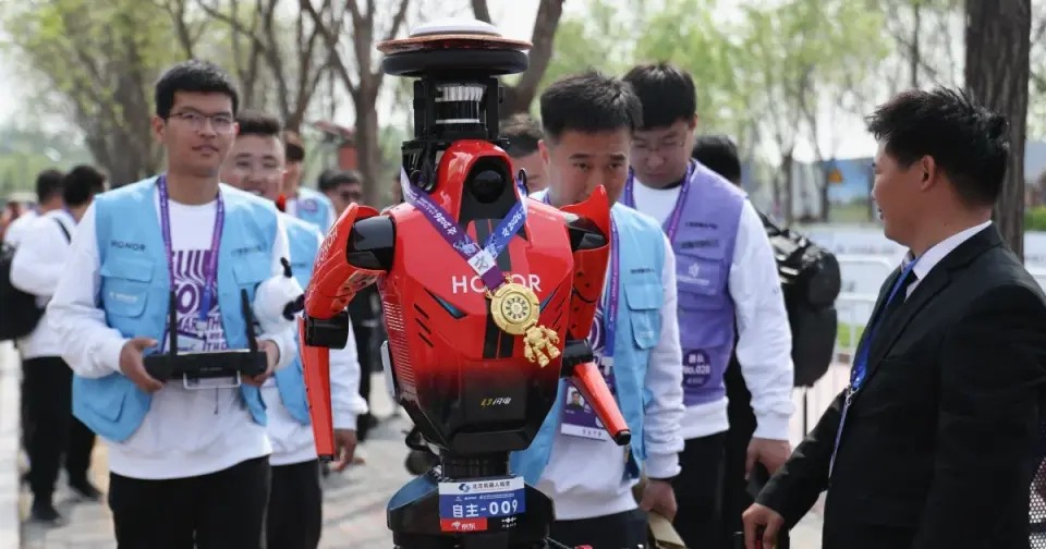 Beijing half-marathon sees humanoid robots outrun humans, signaling rapid AI progress