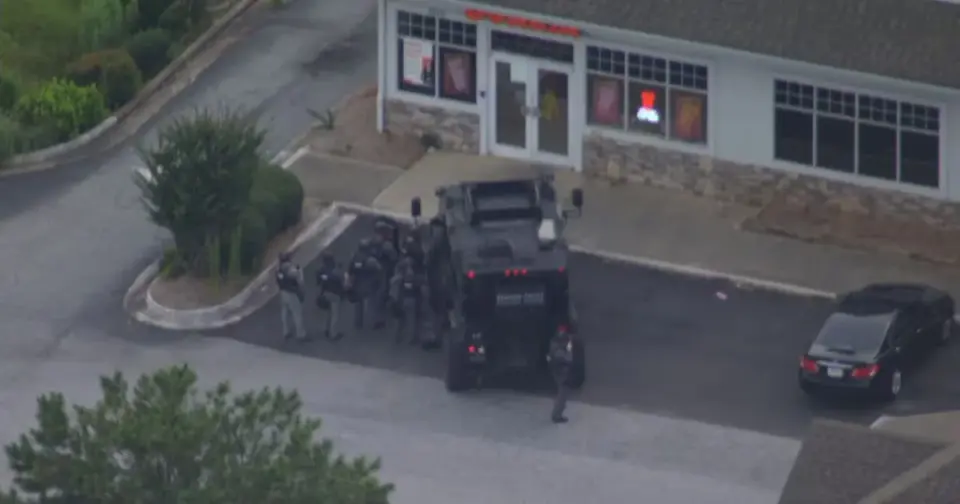 Stolen-car standoff ends with arrest at Newnan Dunkin’
