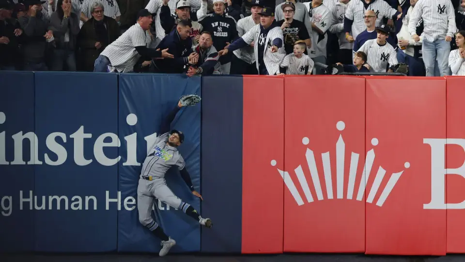 Fan interference call ends Yankees' season in ALDS sweep by Rays