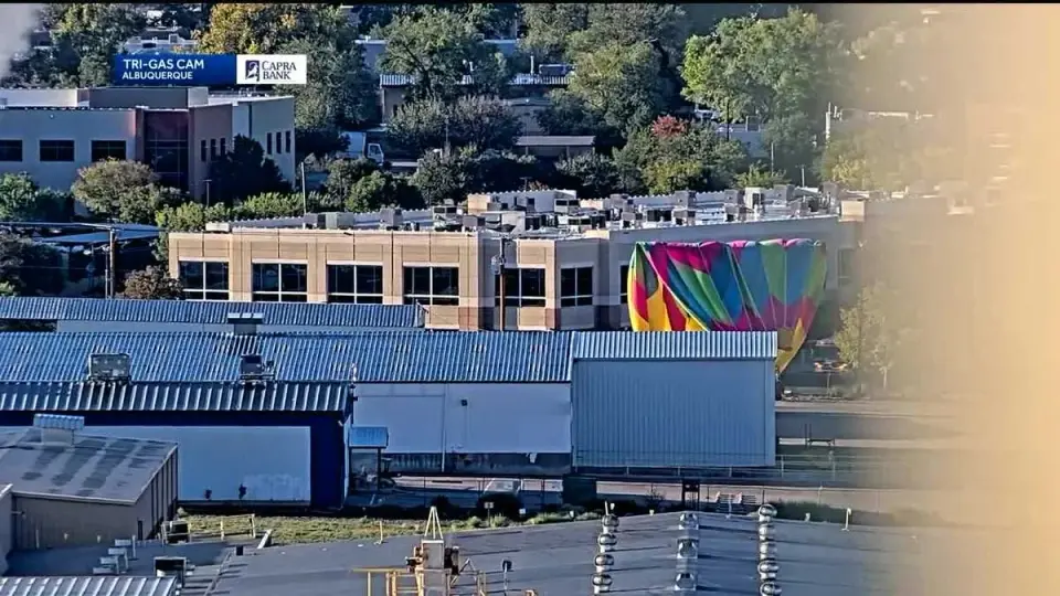 Fiesta Balloon Strikes Power Lines Near Journal Center; Suspect Killed in NMSP Ride-Along