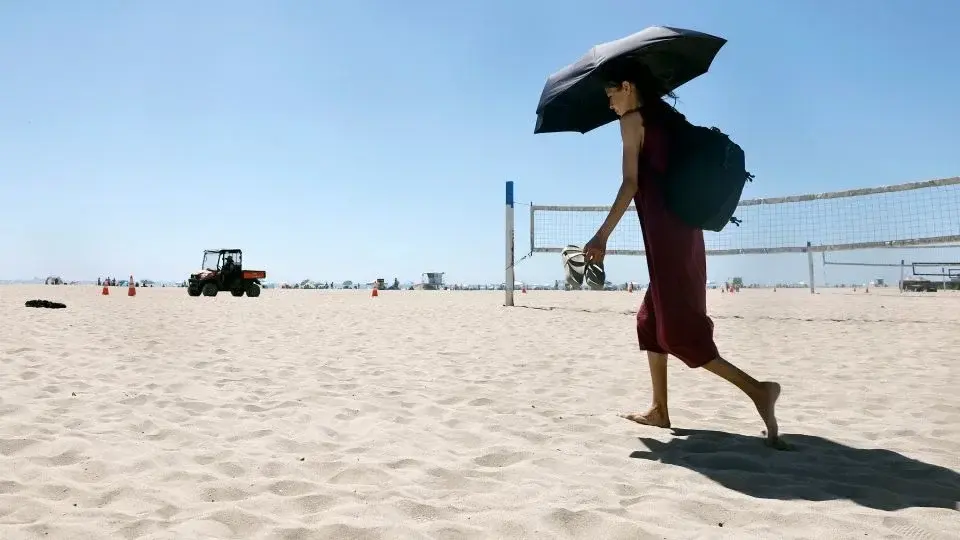 Western heat wave tightens its grip, threatening record temps for millions