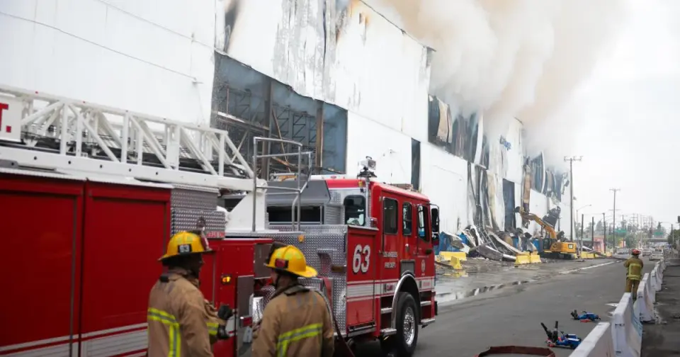 Boyle Heights blaze drags on, spurring school relocations and air-quality warnings