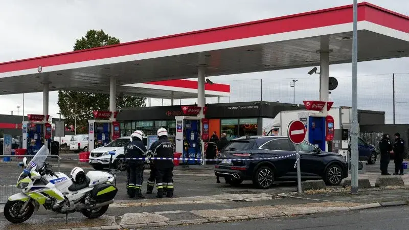 Suspect arrested after drive-by shooting in Paris suburbs kills one and injures four