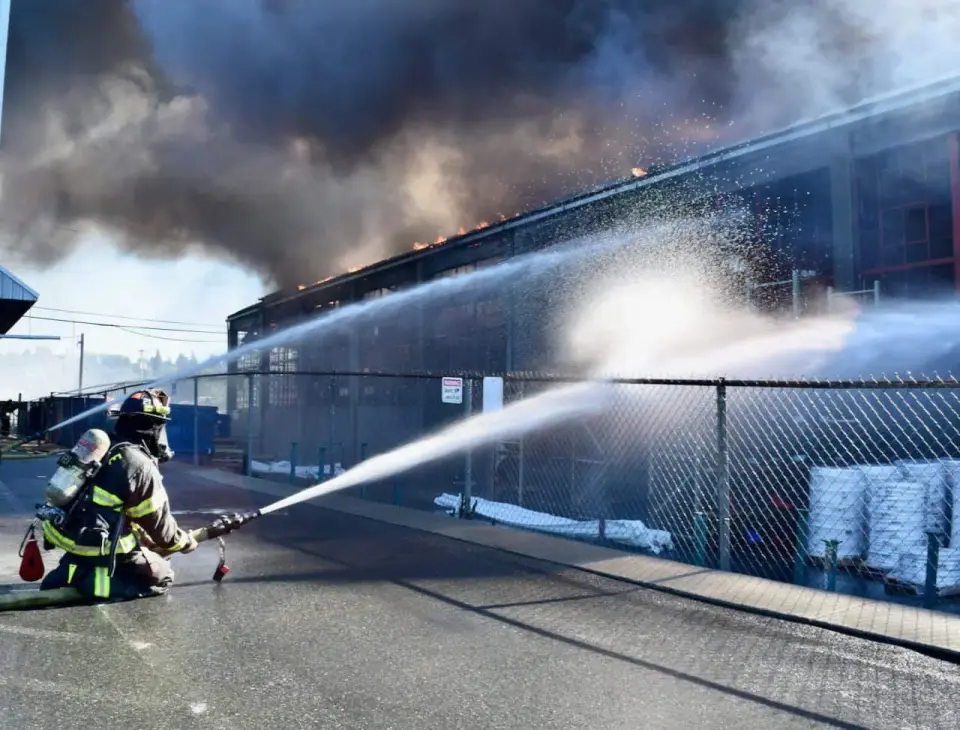 Three-alarm blaze near Ballard-Fremont draws 100+ firefighters