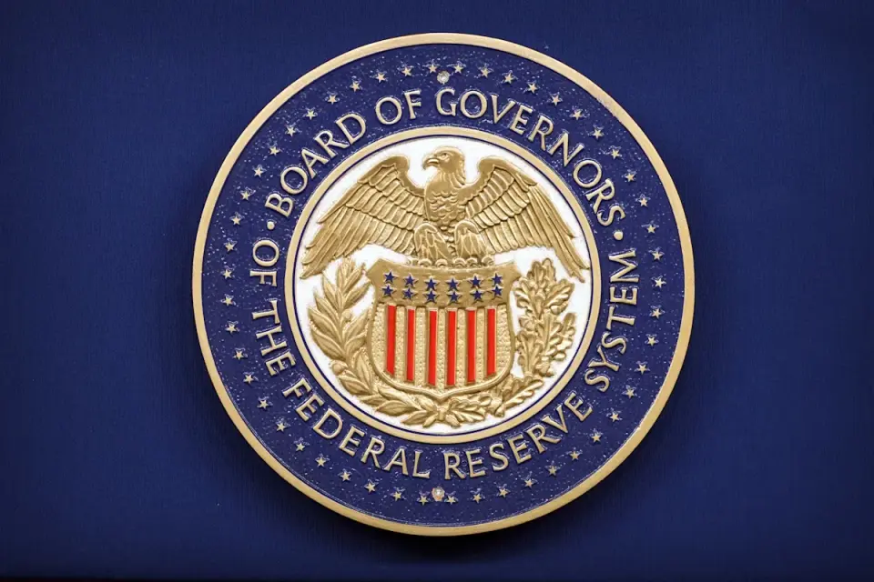 Fed Governor Barr Warns of Rate Hikes if Inflation Fails to Cool