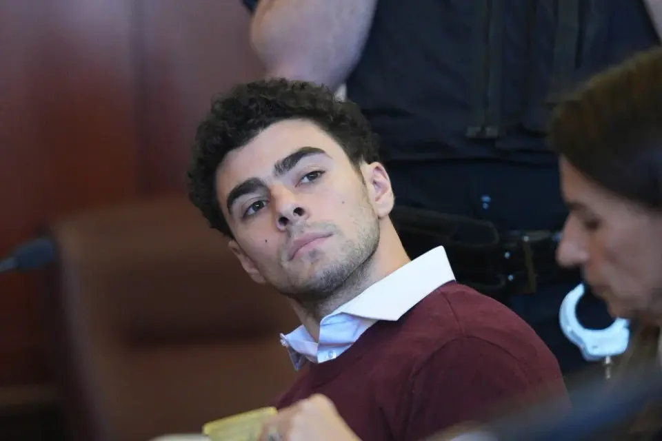 Court OKs gun and notebook for Mangione murder case