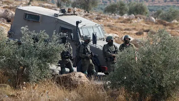 Settlers block court-ordered return of Palestinian family in West Bank, torching homes