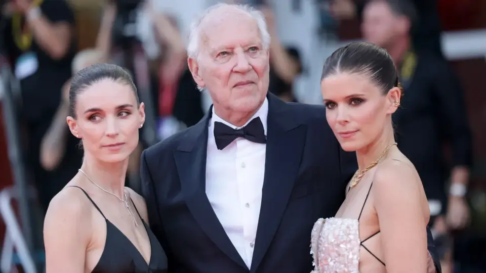 Herzog's 'Bucking Fastard' Divides Critics at Venice Despite Mara Sisters' Unison Debut