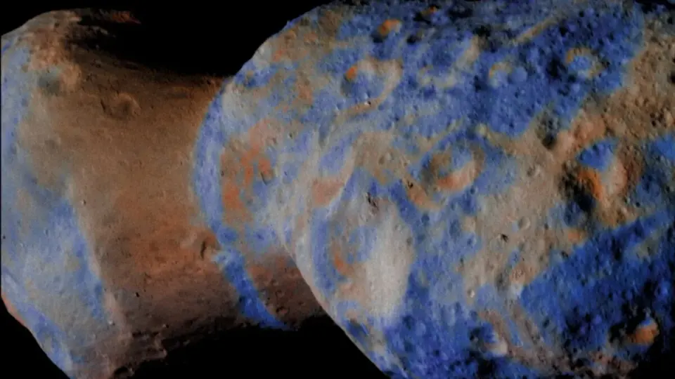 Lucy’s Close Encounter Reveals a Water-Rich Fragment from a Violent Ancient Collision