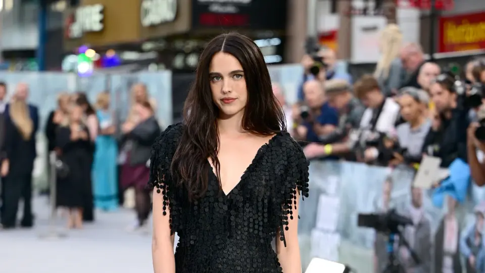 Margaret Qualley Goes Barefoot in Chanel Sandals at London Premiere