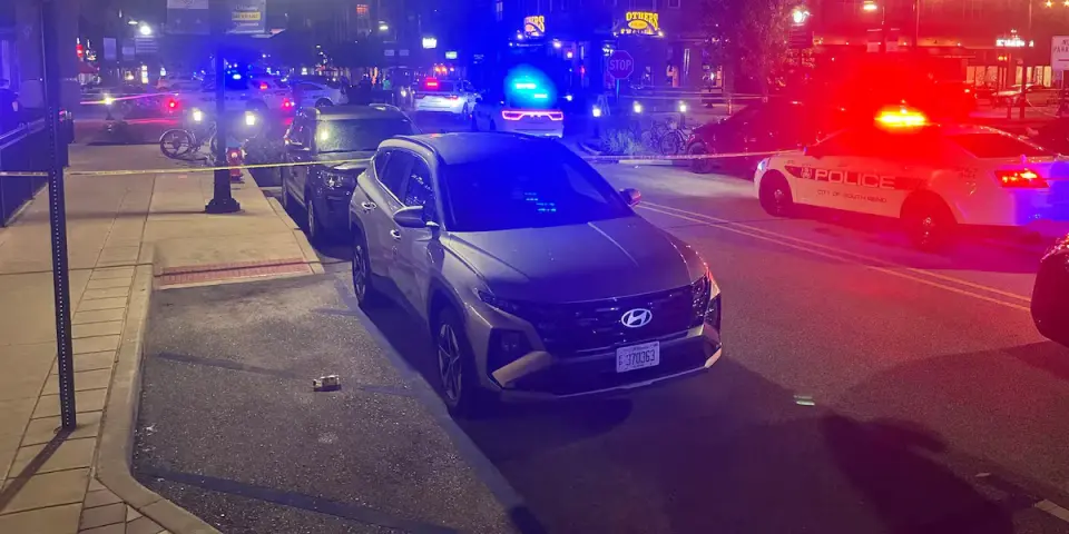 Gunfire at Notre Dame tailgate leaves officer and woman injured; suspect remains at large